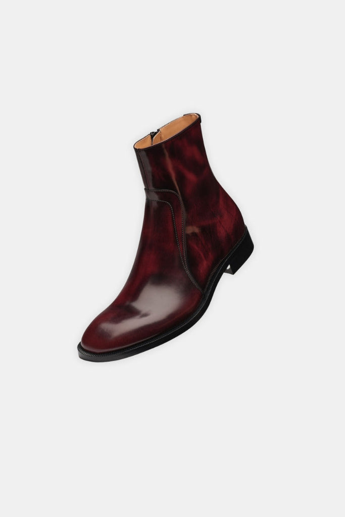 Dark red and black marble-effect leather boots.