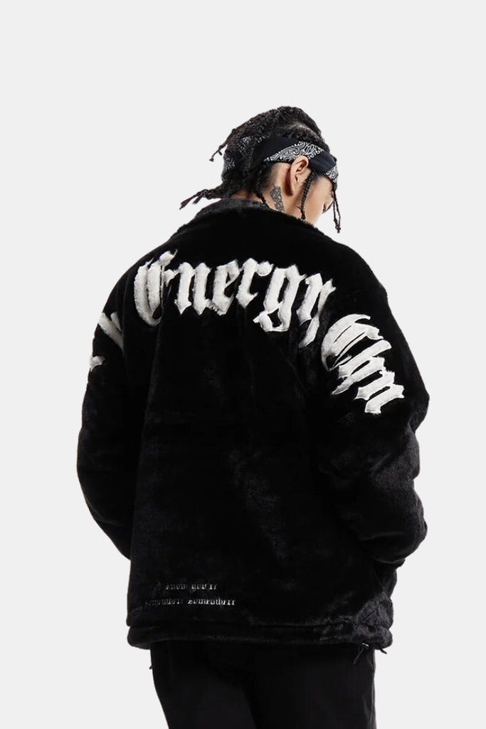 Jacket featuring faux fur and a gothic logo words on the back.